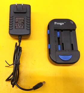 Bm-001 Progo Universal Battery Charger 12v 500ma W Adapter