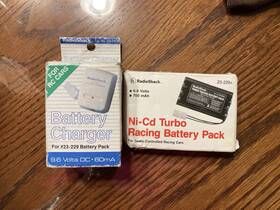 23-229a Radioshack 040293104856 9.6 Volt Dc Charger 60ma And Battery Pack 700 Mah Ni-cd Racing