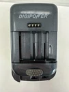 Digipower TC-U450 Universal Battery Charger Gray. Fixed Price $15.00.