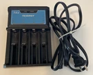 Tenergy T4S 4-BAY Universal Battery Charger Lithium Ion & Aaa Nimh. Fixed Price $17.41.