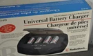 Universal Battery Charger Radio Shack 23-419 Charges 9V, Aaa, C,d, Nickel. Fixed Price $13.00.