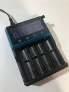 Keenstone HXY-H4 1865 Smart Battery Charger Slot Lcd. Fixed Price $29.99.
