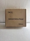 Foval Automatic Trickle Battery Charger 12V 1000MA Smart. Fixed Price $15.00.