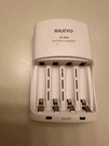 Sanyo NI-MH/NC-MQN06 Battery Charger, White. Fixed Price $9.97.