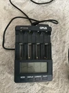 Opus BT-C3100 V2.2 Smart Rechargeable Battery Charger Box Universal Four Slots. Fixed Price $38.00.