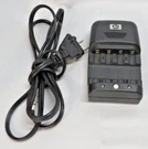 Hp Photosmart Quick Battery Charger Modal # L1815-60001. Fixed Price $5.64.