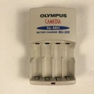 Olympus Aa Battery Charger Nimh BU-300 Camedia Wall Charges 4 Batteries Oem. Fixed Price $7.99.