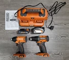 Ridgid 18V Drill And Impact 2AH+4AH BATT+6-PORTCHARGER R860010+R86002+R86096. Fixed Price $169.00.