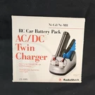 Vintage Nob Radio Shack Rc Car Battery Ac/dc Twin Chargers Ni-mh Ni-cd 23-440. Fixed Price $29.79.