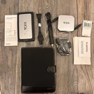 Tumi Ultra Slim Universal Power Adapter Kit Model # 14352. Fixed Price $32.30.