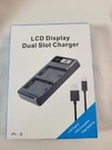 Lcd Display Dual Slot Charger. Fixed Price $20.99.