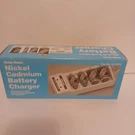 Vintage Radio Shack Nickel Cadmium Battery Charger Sealed 23-132B Free Shipping. Fixed Price $29.99.