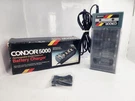 Condor 5000 And Battery Charger With 2 Inserts. Fixed Price $20.00.