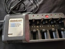Ultralast Battery Charger Model ULCC4H For Ni-cd, Ni-mh And 9V. Fixed Price $14.00.