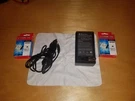 2 Pack Powerextra Digital Battery Charger. Fixed Price $8.00.