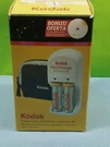 Kodak Mini Kit - Charger, 2 Aa Batteries, Pouch, Tripod. Fixed Price $10.90.