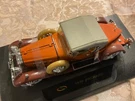 1930 Packard Lebaron Copper & Beige Diecast Car Signature Models. Fixed Price $28.50.