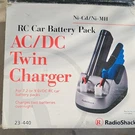 Radioshack 23-440 Ac/dc Twin Charger Dual Port Nimh Nicd Rc Car Battery Pack. Fixed Price $15.13.