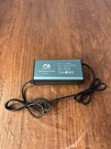 Umiqi 54.6V 2A Lithium Battery Charger YLT-110W-P320 Power Supply. Fixed Price $29.99.