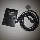Pentax Battery Charger D-BC50. Fixed Price $19.99.