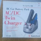 Radioshack Ac/dc Twin Charger Nimh Nicd Defective-battery Alert 23-440. Fixed Price $15.25.