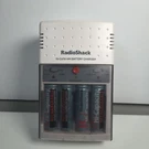 Vintage Radio Shack 23-335 Ni-cd Ni-hm Battery Charger For Aaa 9V Batteries. Fixed Price $12.00.
