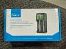 Powxs Smart Charger 2 Bay. Fixed Price $6.99.