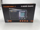 Qfx R-9BLK AM/FM/MW/SW1-7 Radio Black. Fixed Price $26.95.