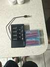 Smart Battery Charger KB-M7 With 4 Batteries Ultrafire. Fixed Price $35.00.
