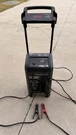 Schumacher 250 Amps 12/24 V Wheeled Battery Charger Jump Starter. Fixed Price $250.00.