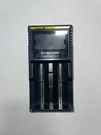 Nitecore D2 Digicharger Universal RCR123A 17650 17670 14500 Aa I2. Fixed Price $10.00.