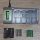 Bonai Lcd Smart D/C/AA/AAA/9V Battery Charger BSTC906W & Rechargeable Batteries. Fixed Price $21.99.