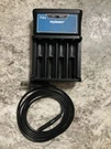 Tenergy T4S 4-BAY Universal Battery Charger Lithium Ion & Aaa Nimh. Fixed Price $18.99.