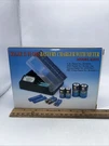 Universal Solar - Vtg Battery Charger 11 One Model #ES879 Nos Camping Must!. Fixed Price $21.99.