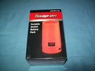 New Snap-on Orange Portable Socket Lithium Battery Pack 5 V 2 Amp SSX18P113O Nib. Fixed Price $52.99.