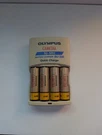 Olympus Camedia Aa Battery Charger Nimh BU-200 With Original Batteries. Fixed Price $12.00.