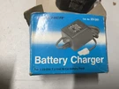 New Archer Battery Charger Cat. No. 23-241A- Output 7.2V Dc. Fixed Price $12.00.