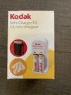 Kodak Mini Charging Kit CH10 Charger & 2 Aa Rechargeable Batteries Pouch Cloth. Fixed Price $7.99.